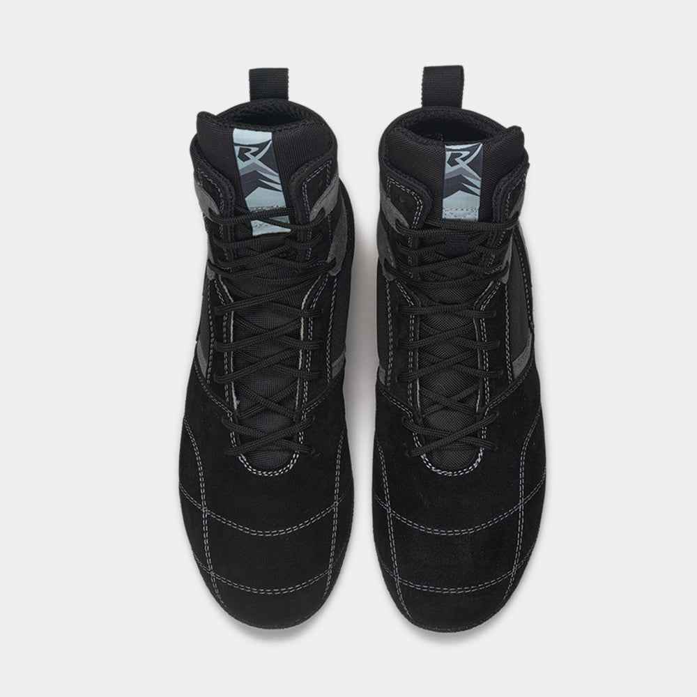 Paire de chaussures de boxe française noires avec lacets et coutures contrastées par Rivat