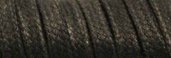 Lacets cirés noir pour chaussures boxe française de la marque Rivat en gros plan texturé