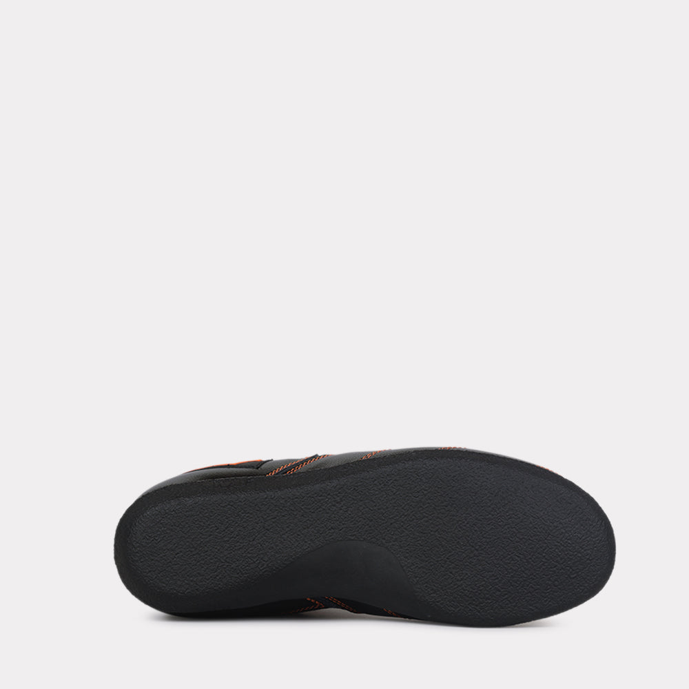 Semelle noire antidérapante de chaussures de boxe française par Rivat vue de dessous