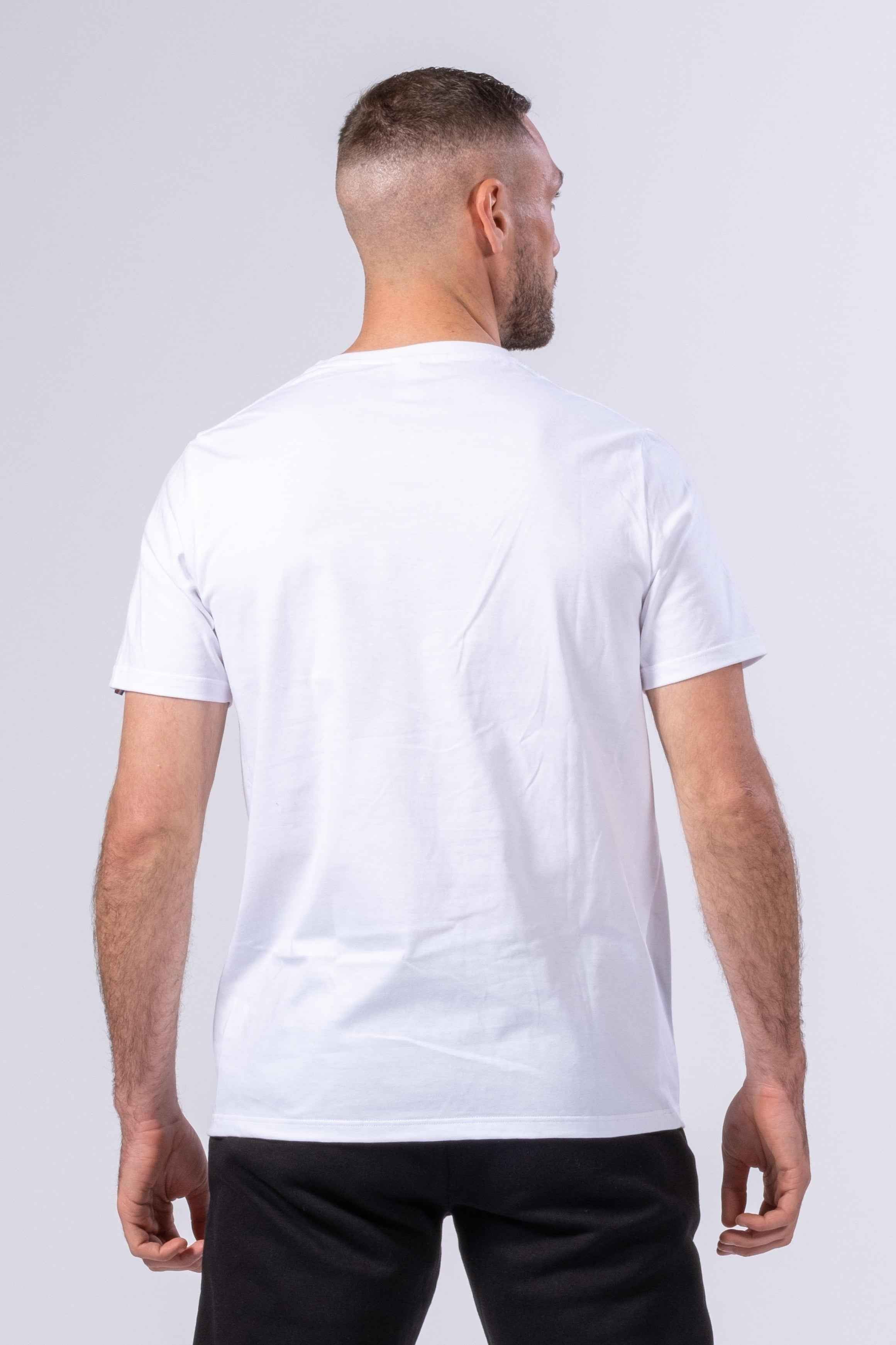 T-shirt homme made in France blanc vu de dos porté par un homme avec un pantalon noir